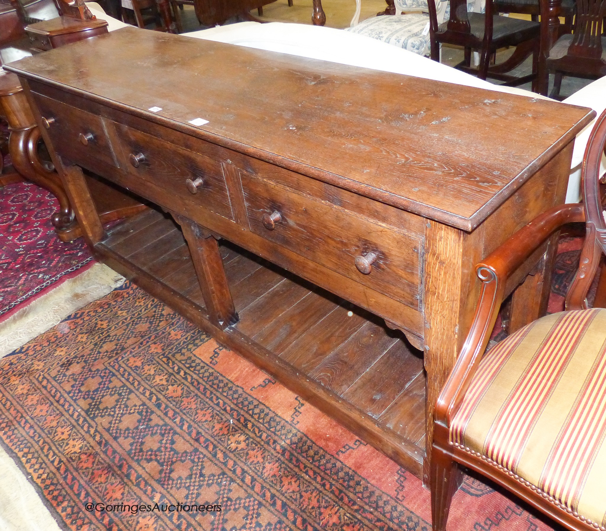 An 18th century style oak pot board dresser base. W-180, D-51, H-86cm.